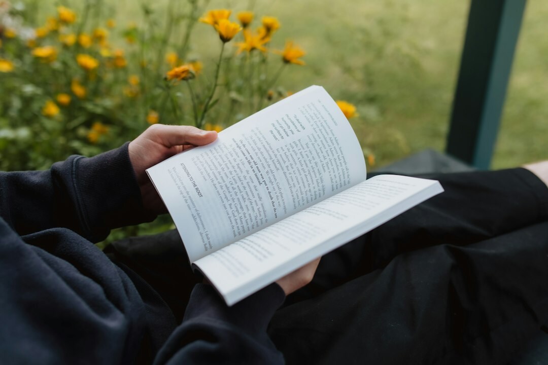 person reading mystery book